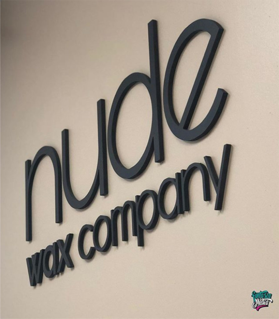 nude wax company interior lobby signage by fantasea media
